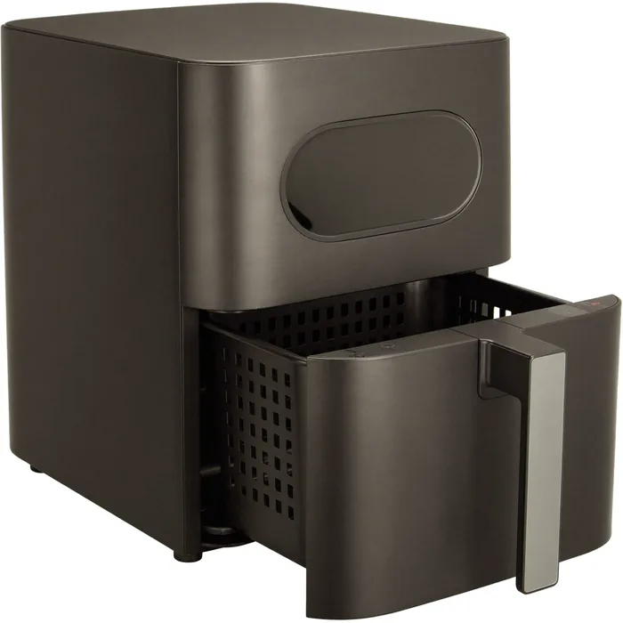 A matte black air fryer with a pull-out basket drawer and a viewing window